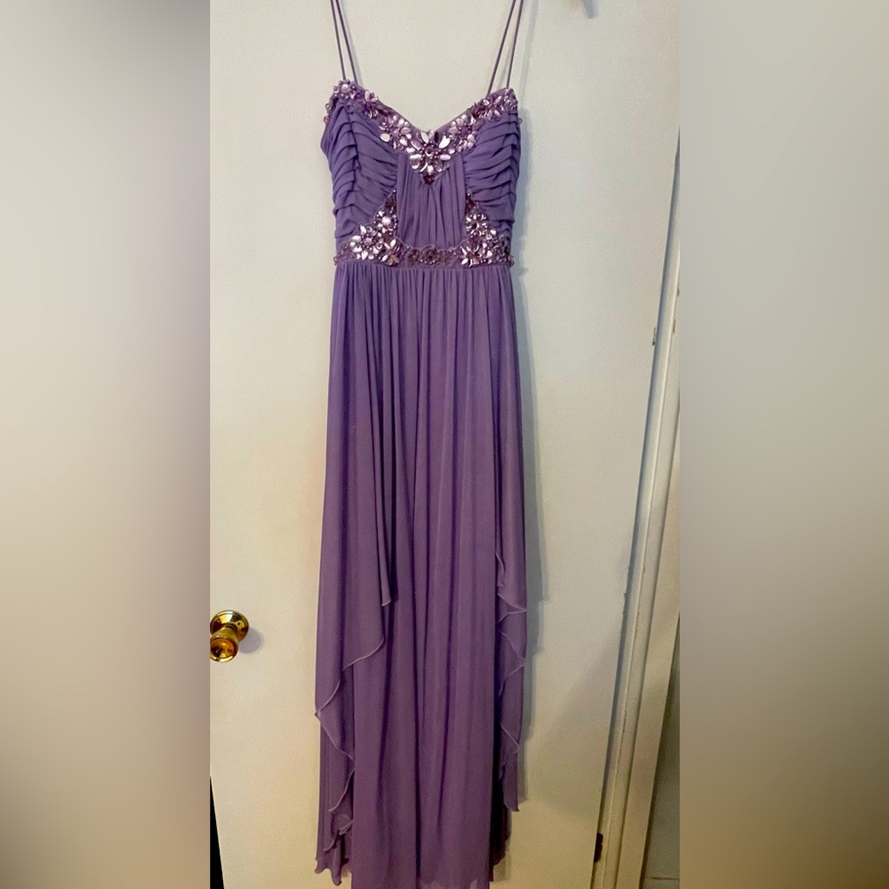 Black tie spaghetti strap evening gown. Barely worn. Great for prom or events!